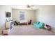 Spacious carpeted bonus room featuring a ceiling fan and bright natural light at 578 Preserve Pointe Blvd, Davenport, FL 33837