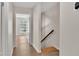 Hallway with stairs leading to the next level at 5850 Cypress Gardens Blvd # 206, Winter Haven, FL 33884