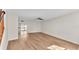 Bright living room featuring new floors and plenty of natural light at 5850 Cypress Gardens Blvd # 206, Winter Haven, FL 33884