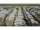 Mobile home in quiet community featuring mature trees, well kept lawns and easy access to nearby amenities at 6053 Southern Oaks Se Dr, Winter Haven, FL 33884