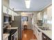 Efficient kitchen with stainless steel appliances and ample cabinet space at 6053 Southern Oaks Se Dr, Winter Haven, FL 33884