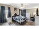 Serene main bedroom featuring soft lighting, comfortable bedding, and ample space at 6053 Southern Oaks Se Dr, Winter Haven, FL 33884