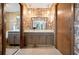A bathroom features an animal print wallpaper and tile flooring at 660 Duggers Way, Lake Wales, FL 33859