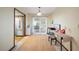 A carpeted bonus room has a desk and a sliding door leading to the outdoors at 660 Duggers Way, Lake Wales, FL 33859