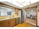 Practical kitchen featuring stainless steel appliances and a functional layout at 660 Duggers Way, Lake Wales, FL 33859