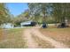 Outbuilding with room for parking equipment or toys at 660 Duggers Way, Lake Wales, FL 33859