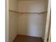 Inside the walk-in closet with wire shelving for organization at 700 Mirror Nw Ter # 111, Winter Haven, FL 33881