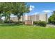 Exterior view of the building with sign in front at 700 Mirror Nw Ter # 111, Winter Haven, FL 33881