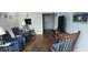 Relaxing living room featuring comfortable seating and a classic decor at 700 Mirror Nw Ter # 111, Winter Haven, FL 33881