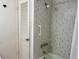 View of tub with shower at 700 Mirror Nw Ter # 111, Winter Haven, FL 33881