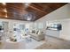 Comfortable living room with wood ceilings and open floor plan at 7016 Village Dr, Lake Wales, FL 33898