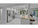 Modern kitchen featuring stainless steel appliances and granite countertops at 734 Canberra Rd, Winter Haven, FL 33884