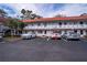Charming two-story condo building with well-maintained landscaping and convenient parking at 1100 Martinique Dr # 106, Winter Haven, FL 33884