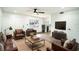 The spacious living room features stylish furniture, recessed lighting, and modern flooring throughout at 1100 Martinique Dr # 106, Winter Haven, FL 33884