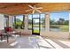 Enclosed outdoor patio offering lots of natural light and views of the pond and golf course at 1103 Country Club Dr # A-3, Lake Wales, FL 33898