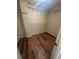 Walk-in closet provides ample storage with multiple rows of shelving at 1130 N Lake Parker Ave # E231, Lakeland, FL 33805
