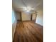 Inviting living room with wood-look floors and bright lighting at 1130 N Lake Parker Ave # E231, Lakeland, FL 33805