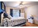 Nautical themed bedroom with a comfortable bed and bright natural light at 125 Bergen Cir, Auburndale, FL 33823