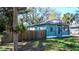 Charming home with a well-kept lawn and an inviting facade at 1325 4Th Ne St, Winter Haven, FL 33881