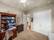 Office space with a ceiling fan, closet, and an adjacent bathroom at 1336 Oakmont Dr, Winter Haven, FL 33884