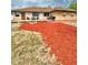 Image of a backyard with a wooden deck, built-in fire pit, and outdoor seating at 1412 Covington Ct, Lake Wales, FL 33853