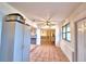 Bright dining area with tile flooring and view of the kitchen and adjacent living space at 1412 Covington Ct, Lake Wales, FL 33853