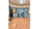 Well-equipped kitchen featuring black appliances, stylish backsplash, and ample counter space at 1412 Covington Ct, Lake Wales, FL 33853