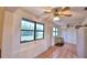 Bright sunroom with large windows, tiled floor, and multiple access points at 1412 Covington Ct, Lake Wales, FL 33853