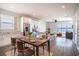 Open-concept living space combines kitchen, dining, and living areas with views of the lake at 153 Summershore Dr, Auburndale, FL 33823