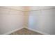Walk-in closet with gray wood-look tile floor and wire shelving at 153 Summershore Dr, Auburndale, FL 33823