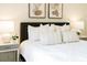 Inviting bedroom showcases cozy decor and complementary bedside lamps and tables at 1703 Linz Ct, Winter Haven, FL 33884