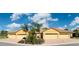 Wide shot of the charming property featuring a well-kept lawn and beautiful landscaping at 1703 Linz Ct, Winter Haven, FL 33884