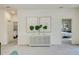 Hallway featuring modern decor, connecting bedrooms for comfortable and private living spaces at 1703 Linz Ct, Winter Haven, FL 33884