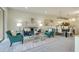 Open concept living room and dining area with stylish furnishings and decor, ideal for entertaining and relaxation at 1703 Linz Ct, Winter Haven, FL 33884