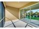 Covered patio with sliding glass doors offering seamless indoor-outdoor living at 1703 Linz Ct, Winter Haven, FL 33884