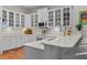 Bright kitchen with white cabinets and tile flooring at 20143 Sunset Landing Ave, Groveland, FL 34736