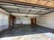Attached garage with built in shelving on both sides for all your storage needs at 2016 Amesbury Dr, Auburndale, FL 33823
