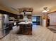 Spacious kitchen with a center island and stainless steel appliances at 2016 Amesbury Dr, Auburndale, FL 33823