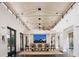 Elegant dining room with vaulted ceilings, clerestory windows, and seating for ten at 2300 N Scenic Hwy # 120, Lake Wales, FL 33898