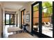 Hallway leading to courtyard with view to outdoor lounge area at 2300 N Scenic Hwy # 120, Lake Wales, FL 33898