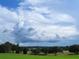 Scenic landscape with towering cloudscape and lush greenery at 2300 N Scenic Hwy # 120, Lake Wales, FL 33898