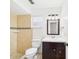 Updated bathroom with tiled shower and dark wood vanity at 2434 Mill Run Blvd, Kissimmee, FL 34744