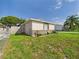 Charming home exterior with stone accents and well-maintained landscaping at 2434 Mill Run Blvd, Kissimmee, FL 34744
