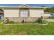 Charming single-story home with stone accents and landscaped front yard at 2434 Mill Run Blvd, Kissimmee, FL 34744