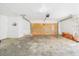 Spacious garage with wooden door, plenty of room for parking and storage at 2434 Mill Run Blvd, Kissimmee, FL 34744