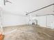 The garage features a laundry area, overhead lighting and space for parking at 2434 Mill Run Blvd, Kissimmee, FL 34744