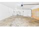 Spacious garage with washer, dryer hookups, and water heater at 2434 Mill Run Blvd, Kissimmee, FL 34744