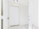 Interior hallway featuring a closet, tile flooring and neutral-toned walls at 2434 Mill Run Blvd, Kissimmee, FL 34744