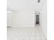 Spacious living room with white tile flooring at 2434 Mill Run Blvd, Kissimmee, FL 34744