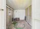 Interior of a storage shed with paneling and a concrete floor at 2434 Mill Run Blvd, Kissimmee, FL 34744